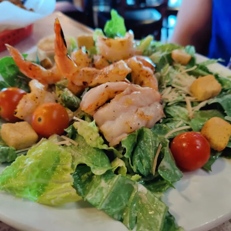 Caesar salad with grilled shrimp added at Blackbeards' Restaurant