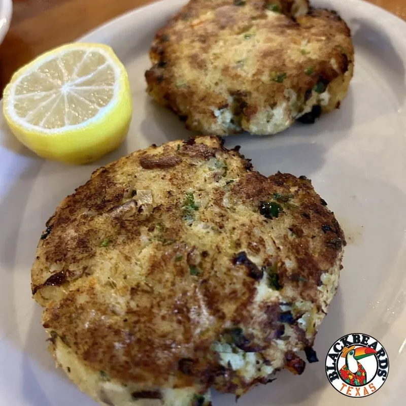 Two crab cakes with lemon at Blackbeards' Restaurant