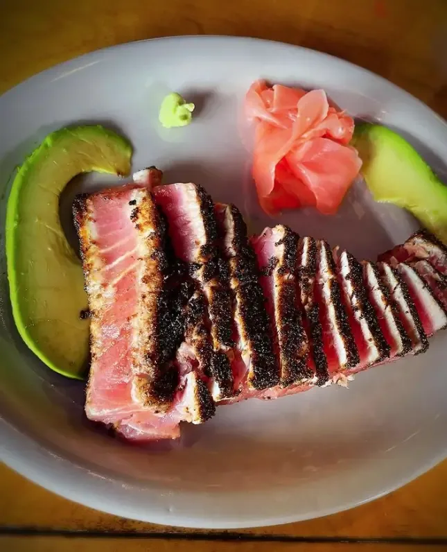 Sliced seared ginger teriyaki ahi tuna at Blackbeards' Restaurant