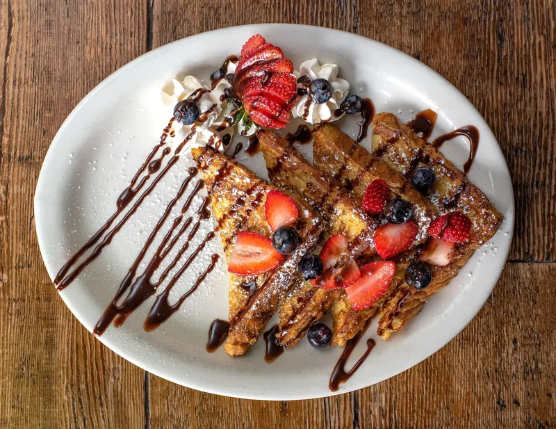 Classic French Toast with berries at Grapevine Cafe