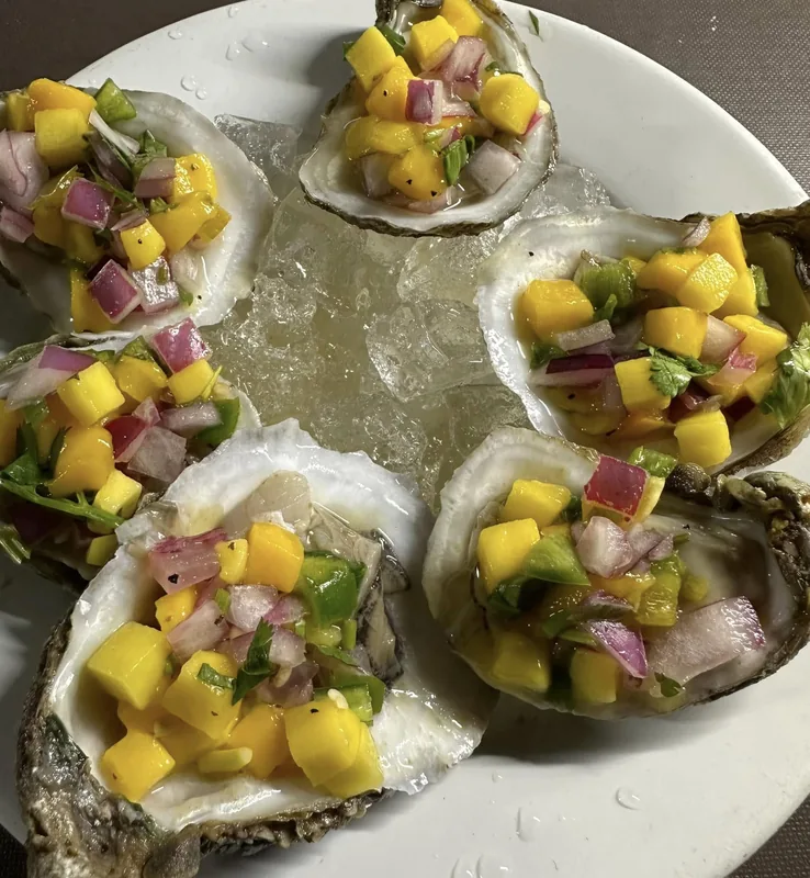 Mango aguachile oysters1/2 Doz. at Liam's