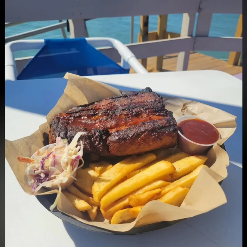 The Sunday special at Louie's Backyard: a half rack of ribs with slaw and fries